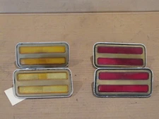 76-81 FIREBIRD TRANS AM AMBER FRONT AND RED REAR SIDE MARKER LIGHTS SET OF 4