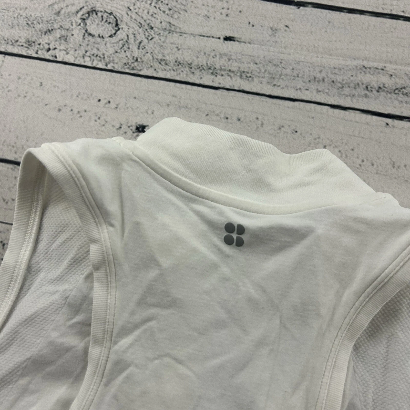 sweaty-betty 1/4 zip sleeveless athletic shirt