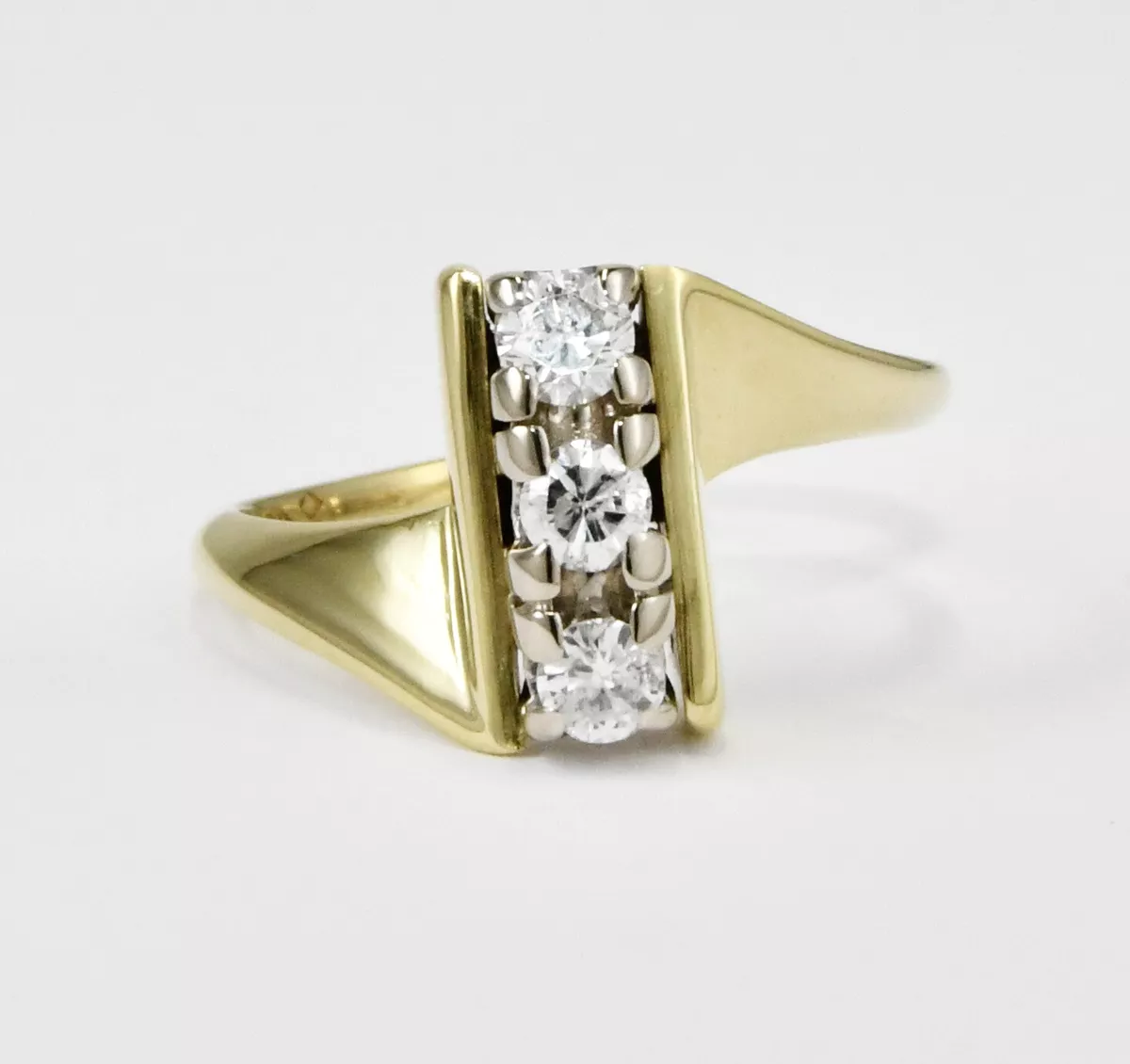 Vertical 3 2024 stone diamond ring