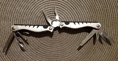 9-in-1 Stainless Steel Multi-Tool Pliers Knife Phillips File Serrated Blade