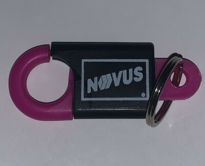 VINTAGE PINK BLACK NOVUS KEYCHAIN 