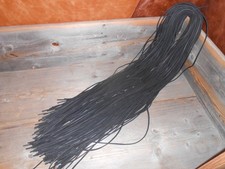 One pair of 36" long 1/8" wide black rawhide leather boot / shoe laces.