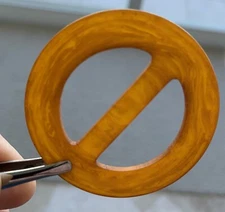 Swirled Bakelite Deco.  Each is about 2" wide and 1/16" deep.  Per piece price.