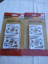 Bed Bath & Beyond Table Cloth Clamps 2 sets.