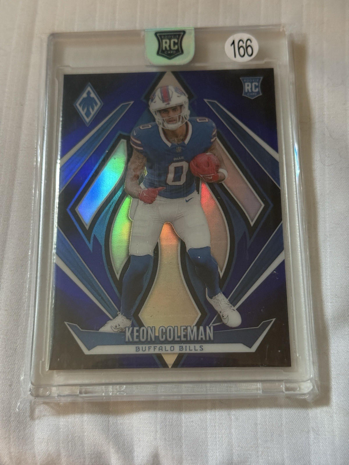 2024 Panini Phoenix - Rookies Keon Coleman #213 Blue Fade /249 (RC)