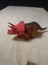 Vintage Triceratops red and green dinosaur 4 in tall by 9 and 1/2 in Long
