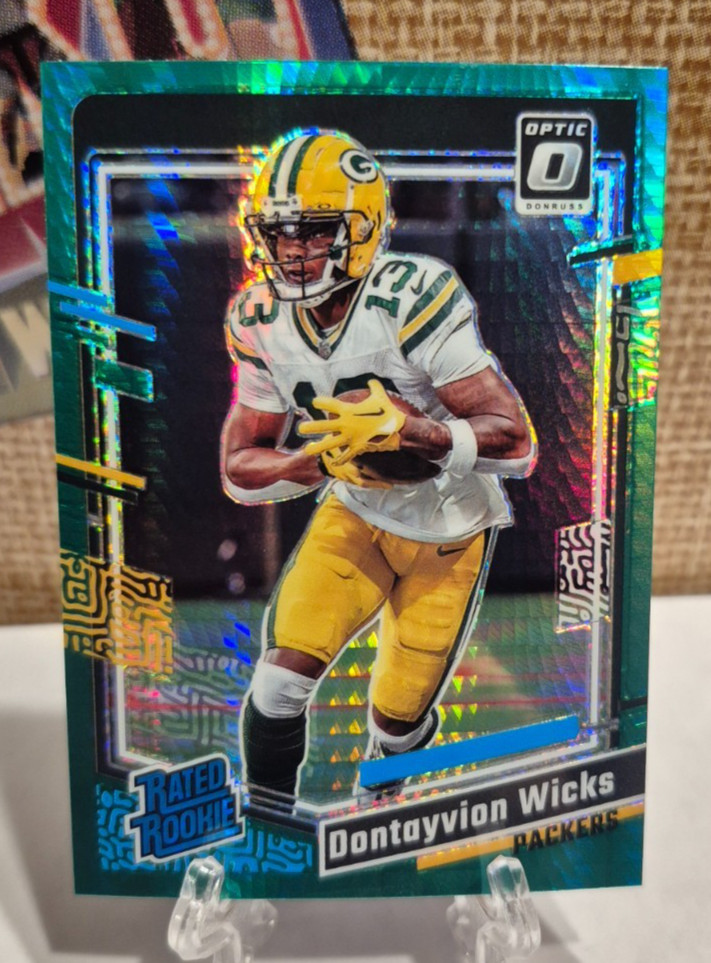 2023 Donruss Optic #249 Dontayvion Wicks Rookie Green Hyper  N