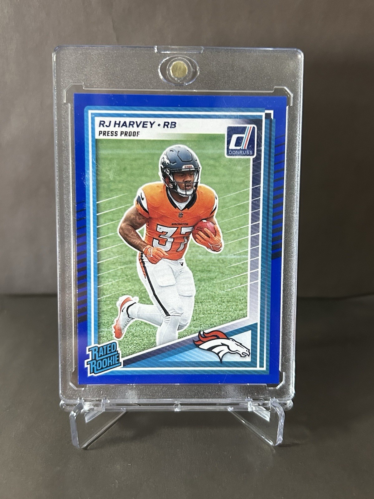 2025 Panini Donruss Rated Rookie RJ Harvey #312 Press Proof Blue (RC)
