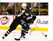 DALLAS STARS RADEK DVORAK SIGNED SKATING THE PUCK 8X10