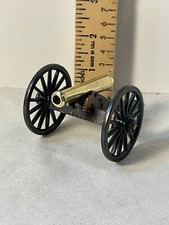 Brass and metal miniature cannon figurine