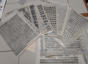 Large collection of press type, adhesive letters, and stencils for arts & crafts