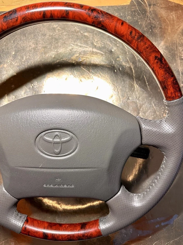 Volante Toyota Land Cruiser Serie 100 Marrón Lexus LX470 Madera Perforada Foto 4 de 4