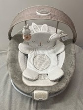 ingenuity Inlighten baby bouncer with music and vibration.