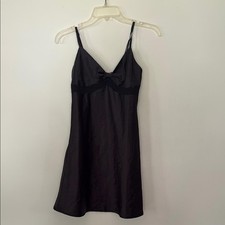Elegant silky black slip dress with bow and lace