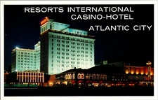 Postcard Night View of Resorts International Casino-Hotel  Atlantic City NJ