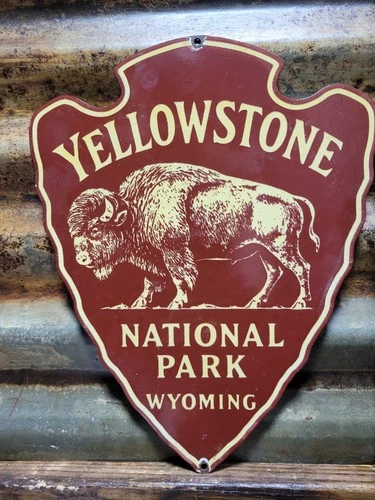 VINTAGE YELLOWSTONE PORCELAIN SIGN OLD NATIONAL PARK WYOMING BISON ARROWHEAD 12"
