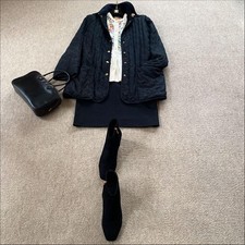 USED A HIGH-QUALITY AND VERY STYLISH PADDED HALF COAT FROM HERMES GOOD