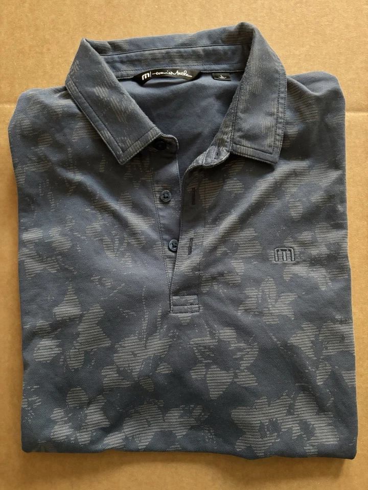 Polo de golf Travis Mathew Hootenanny para hombre talla grande azul floral atletismo Foto 2 de 4