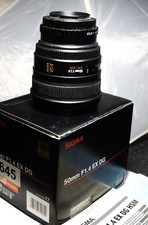 Near Mint Sigma 50mm f/1.4 EX DG HSM  with Sony A /E adapter.