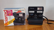 Polaroid One Step Instant Flash Camera W/Strap 600 Film - Untested W/Box