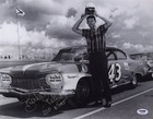 Richard Petty SIGNED 11x14 Photo + 200 Wins PSA/DNA AUTOGRAPHED