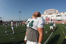 Center Nick Mangold New York Jets stretches during New York Jets T- 2009 Photo