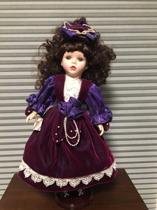 doll with purple dress
