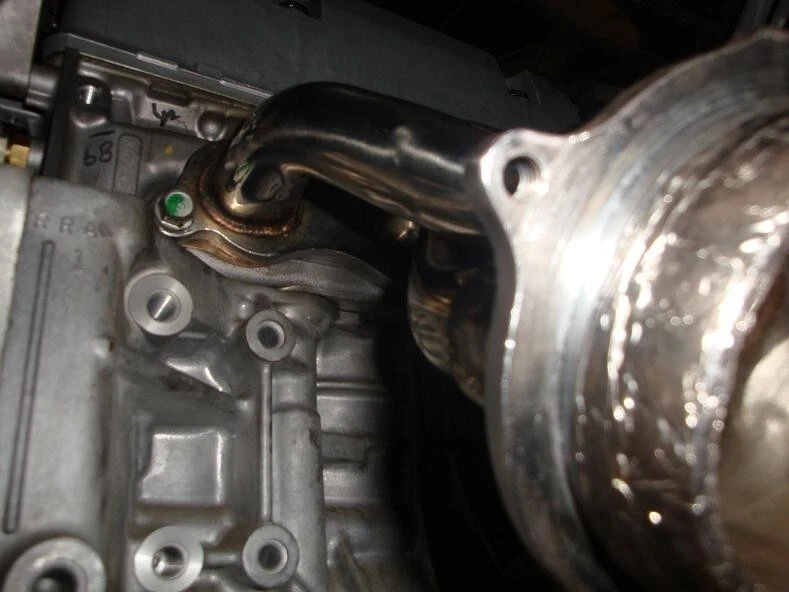 Cabezal de acero inoxidable Megan Racing: Honda Civic Si 06-09 Foto 2 de 4