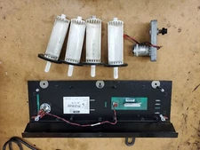 Tidel Tacc II A; One motor with gear, 4 coin chutes, 1 control board with 1 key 