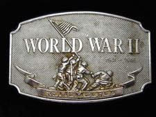 QA11144 VINTAGE 1990 WORLD WAR II REMEBERED MILITARY COMMEMORATIVE BELT BUCKLE
