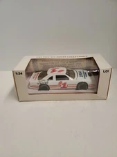 #1 1994 Manufacturers Champion Ford 1 of 1000 made LCI Collectibles 1:24  CWC