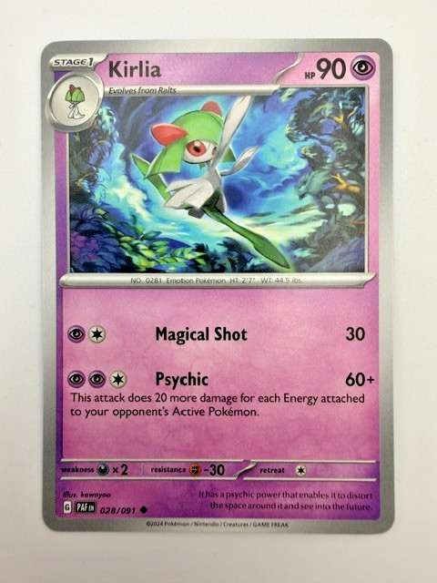 #028/091 Kirlia Normal Uncommon - Pokémon Paldean Fates English Near Mint