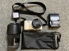 Sony Alpha NEX-5N Digital Camera Silver with SEL16F28 SEL55210 Lenses Used