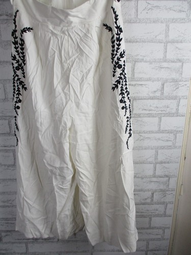 SHEIKE Mujer Mono Blanco Negro Floral Bordado Ribete 12 Recortes - Imagen 3 de 10