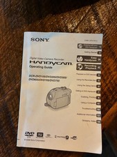 Sony Handycam DCR-DVD105E Camcorder, charger, instructions, and case