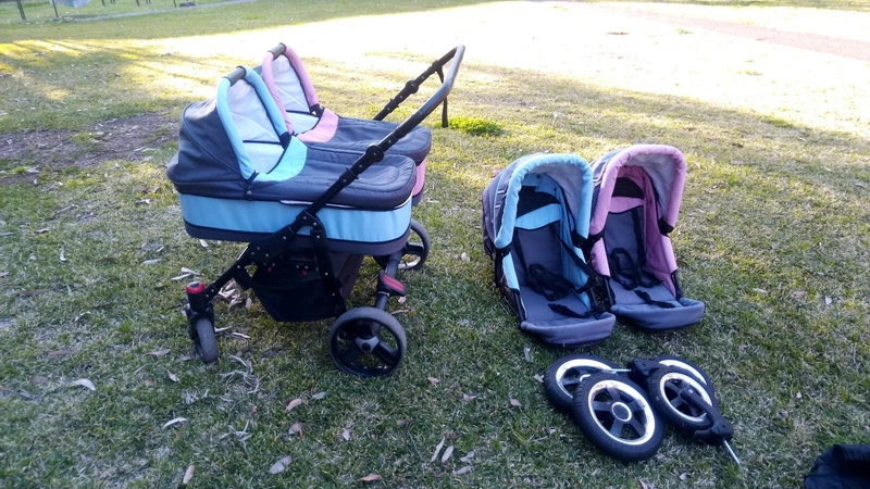 pink and blue double pram