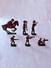 Six Metal Toy Soldiers