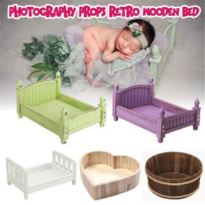 newborn baby wooden bed