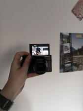 Sony DSC-RX100 III digital camera with accessories