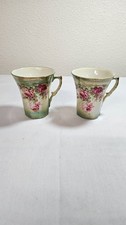 Antique hand painted tea cup pair