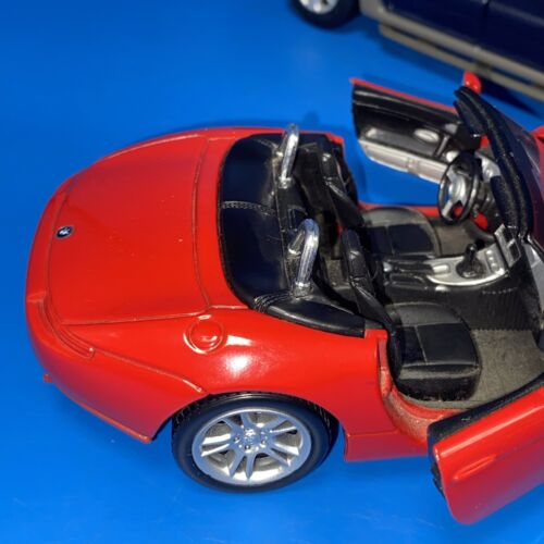 Maisto Ford Explorer Sport Trac Special Edition 1/25 & 1:24 rot BMW Z28 Menge 2 - Bild 2 von 22