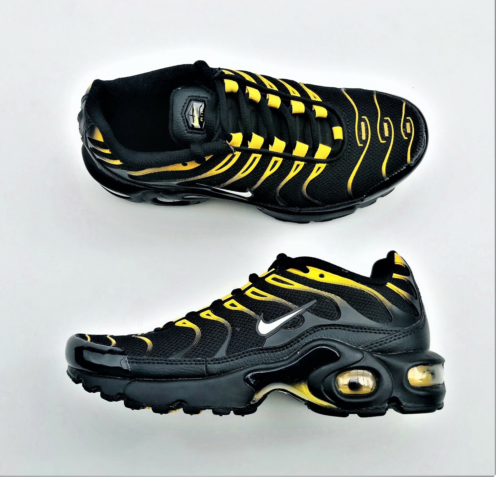 nike air max plus womens black and yellow