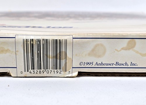 Round 13" glass platter with white label showing Anheuser-Busch logo and barcode round 07192, made in USA.