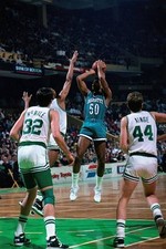 Robert Reid Charlotte Hornets shoots a jump shot v Kevin McHale an- Old Photo