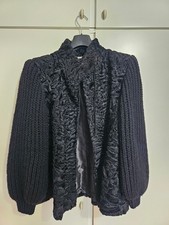 Giacca di Astrakan nera con maniche di lana, artigianale.