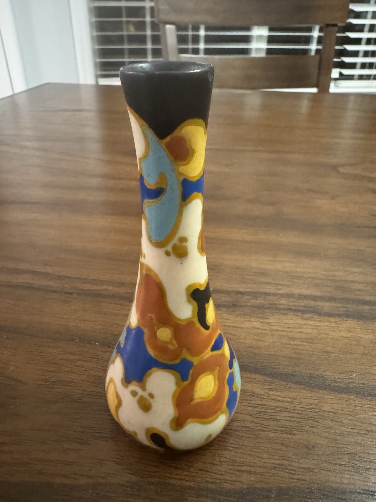 Regina Gouda Holland Vase featuring a colorful, hand-painted Floral Design