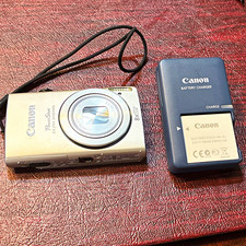 Canon PowerShot ELPH 310 HS Silver 12.1MP Compact Camera 8x Zoom w/Charger