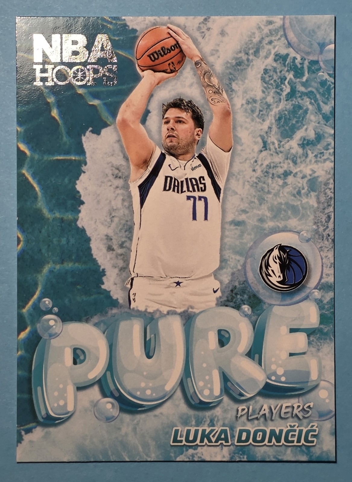 Luka Doncic #10 Basketball Cards 2024 Panini NBA Hoops Pure Players trading card — raw and PSA graded price guide