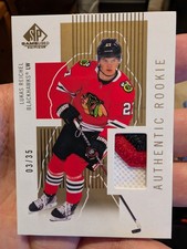 2022-23 SP Game Used Retro Renovations Rookie Lukas Reichel 3/35 Hawks Canucks