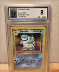 Vintage 1999 Pokémon Blastoise Holo – Base Set Unlimited – Graded 8 NM/Mint